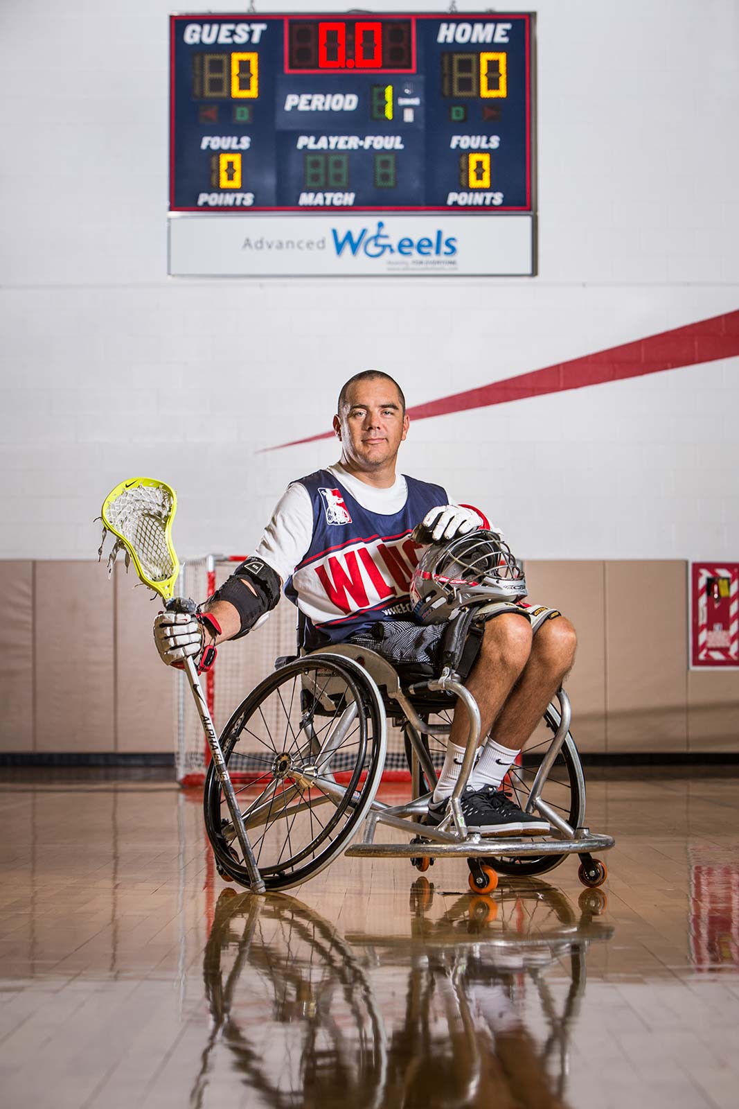 graphic portrait of advocate for disabled athletes posing in wheelchair with lacrosse stick