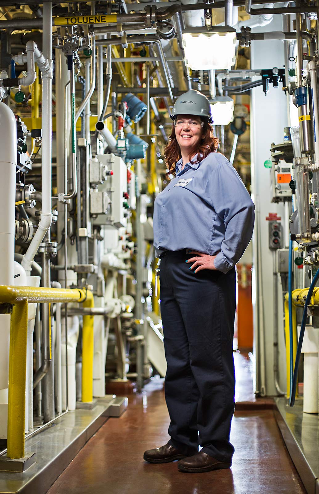 Location Portrait of female worker in industrial faciltiy in the United States