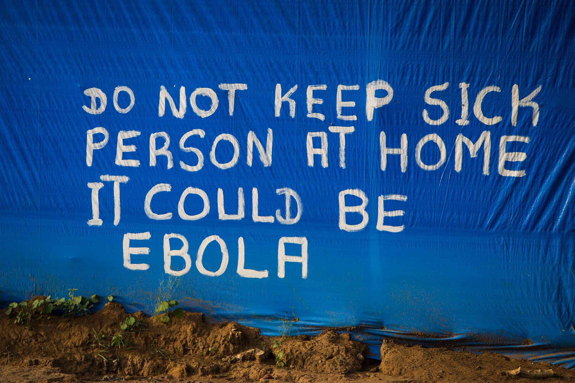 Hand painted warning of the dangers of the Ebola virus in Liberia