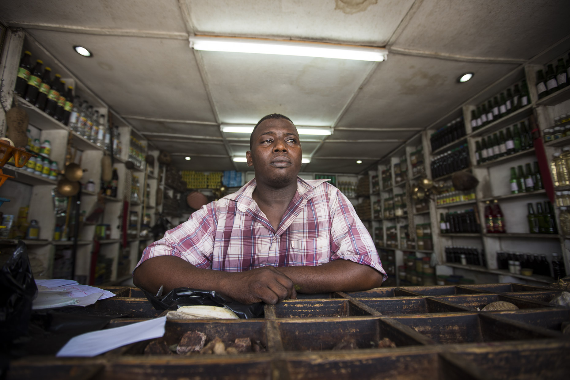 Portrait of an East African shop owner who trades is goods used for Witchcraft
